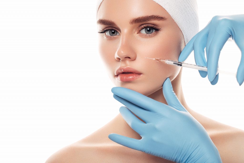 Woman having facial injections